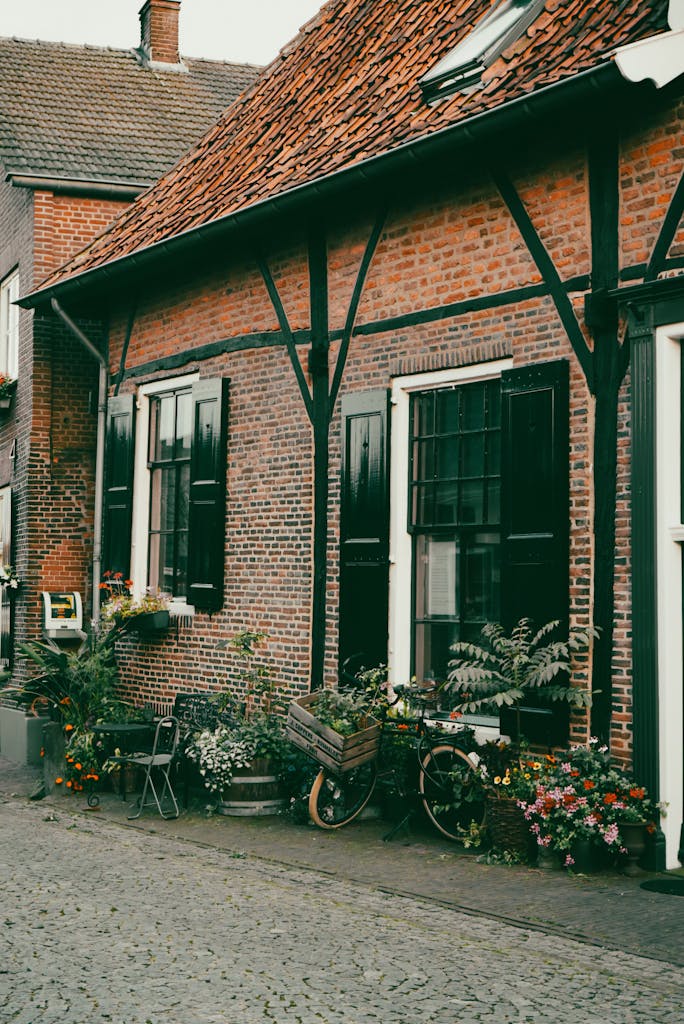 A brick building with a bike parked outside